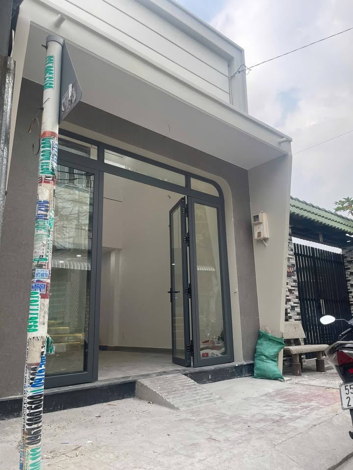 Nhà mặt tiền Nhựa Bà Điểm 60m² giá 4.95 tỷ - Vị trí đắc địa, kinh doanh thuận lợi!