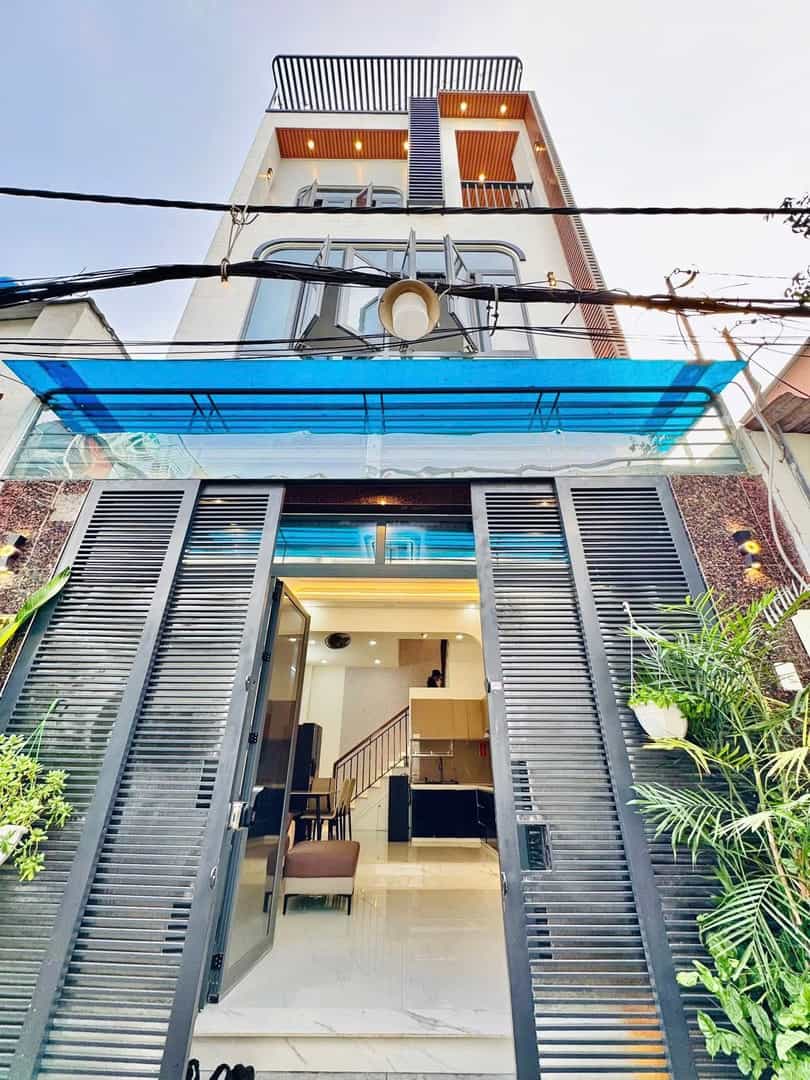 Bán nhà hẻm xe hơi 5m đường Nơ Trang Long P7 Bình Thạnh 34,6m2 giá 3.45 tỷ - Sổ hồng chính chủ ngay trong ngày!