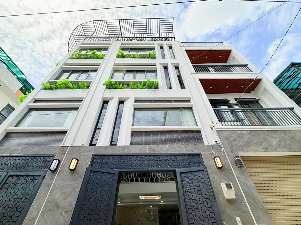 Nhà 5 tầng hẻm xe hơi Bùi Quang Là 34m² giá 6.78 tỷ - Khu dân trí cao, tiện ích đầy đủ!