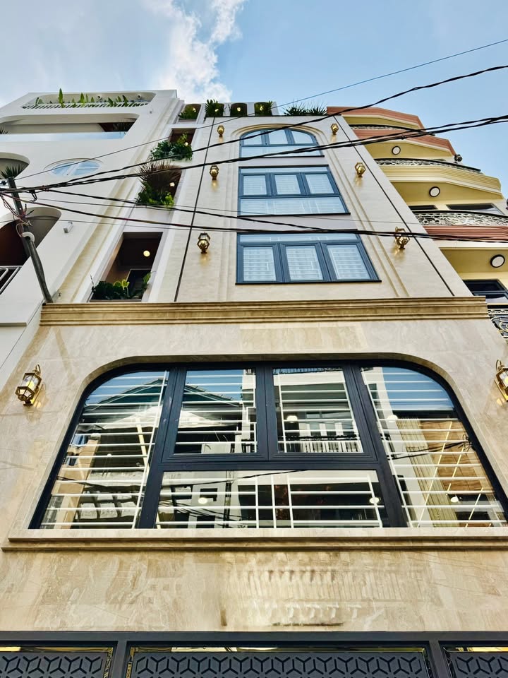 Nhà phố Thống Nhất, Gò Vấp 75m² giá 15 tỷ - Thang máy, xe hơi ngủ trong nhà!