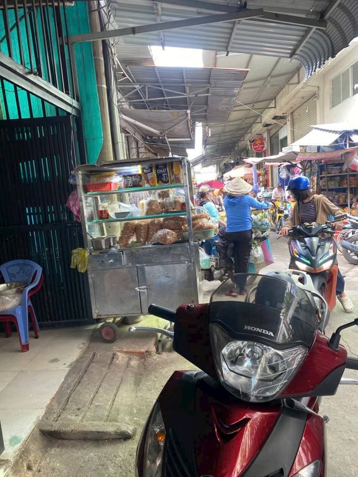 Nhà mặt tiền chợ Vĩnh Phú, 60m² giá 4.55 tỷ - Đầu tư lý tưởng cho kinh doanh!