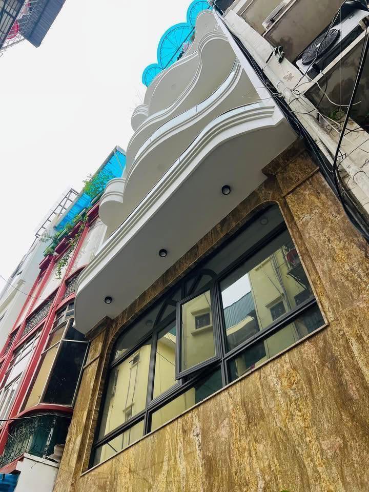 Nhà phố Giảng Võ Đống Đa 58m² giá 24.99 tỷ - Ô tô vào nhà, có thang máy!