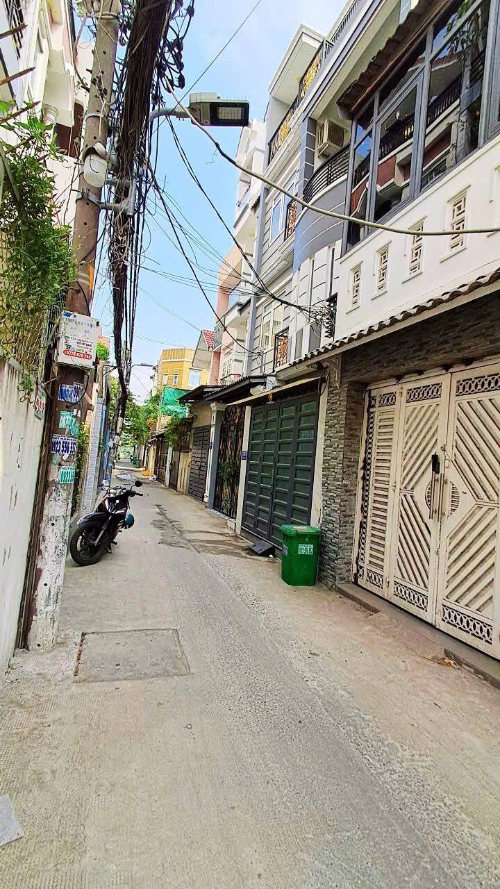 Nhà 4 tầng hẻm 4m Phú Thuận Quận 7, 52m² - Pháp lý chuẩn, xe hơi đậu cửa!