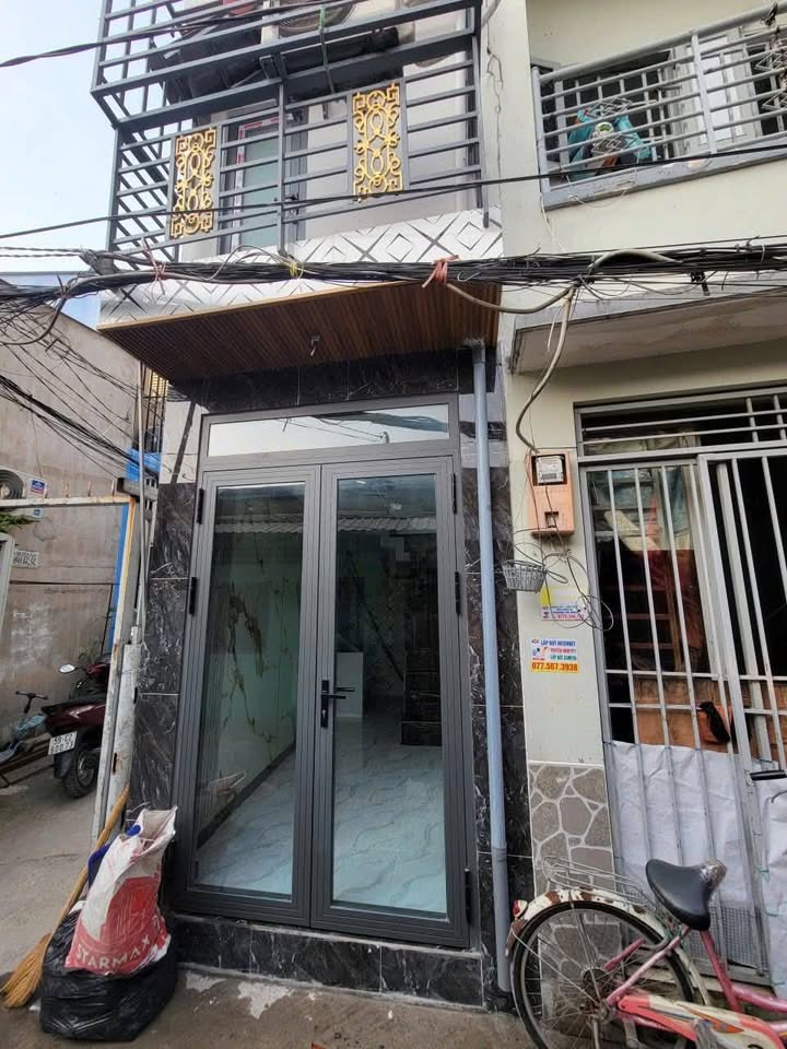 Nhà 2 tầng hẻm xe hơi 5m đường Trần Xuân Soạn, Quận 7 - Giá thương lượng hấp dẫn!