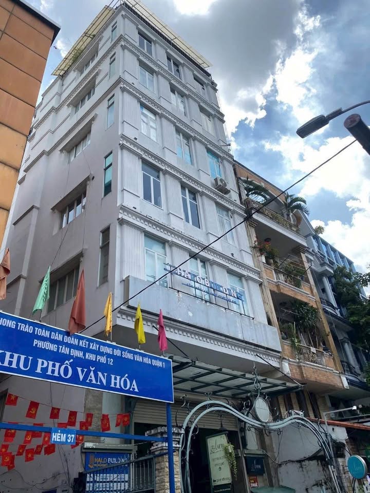 Bán toà nhà góc 2 mặt tiền Đinh Công Tráng, Q.1, 102m² - Dòng tiền ổn định 140 triệu/tháng!