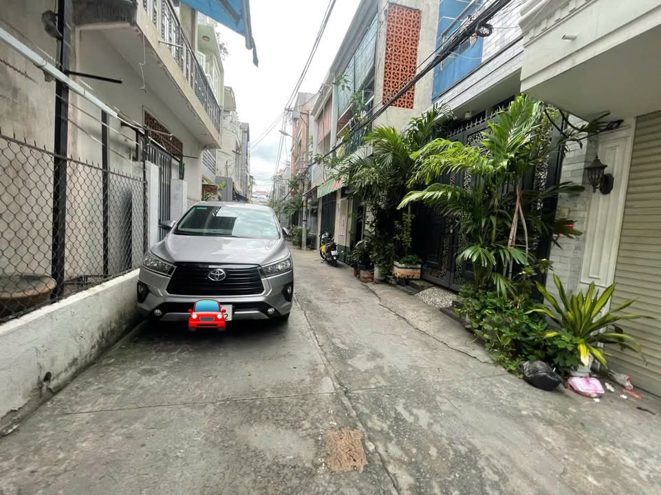 Nhà 4 tầng Quận 3, 61m² giá thỏa thuận - Ô tô vào nhà, tiện nghi đầy đủ!