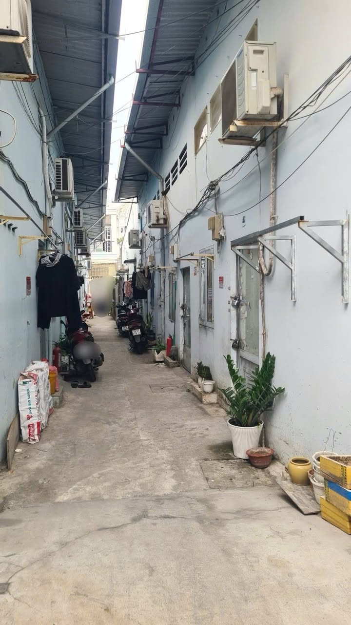 Dãy nhà trọ 2 mặt hẻm Phú Thuận Quận 7 99m² giá 7.4 tỷ - Dòng tiền ổn định