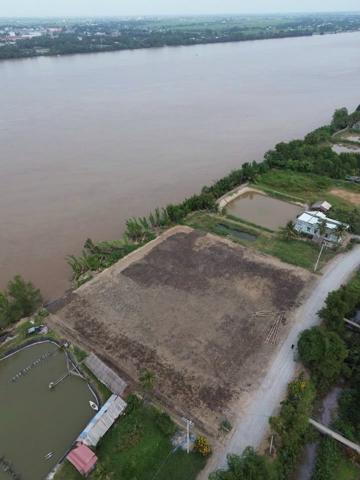 Đất nền mặt tiền sông Tân Phú Đông 588m² giá 750 triệu - Sổ đỏ chính chủ!