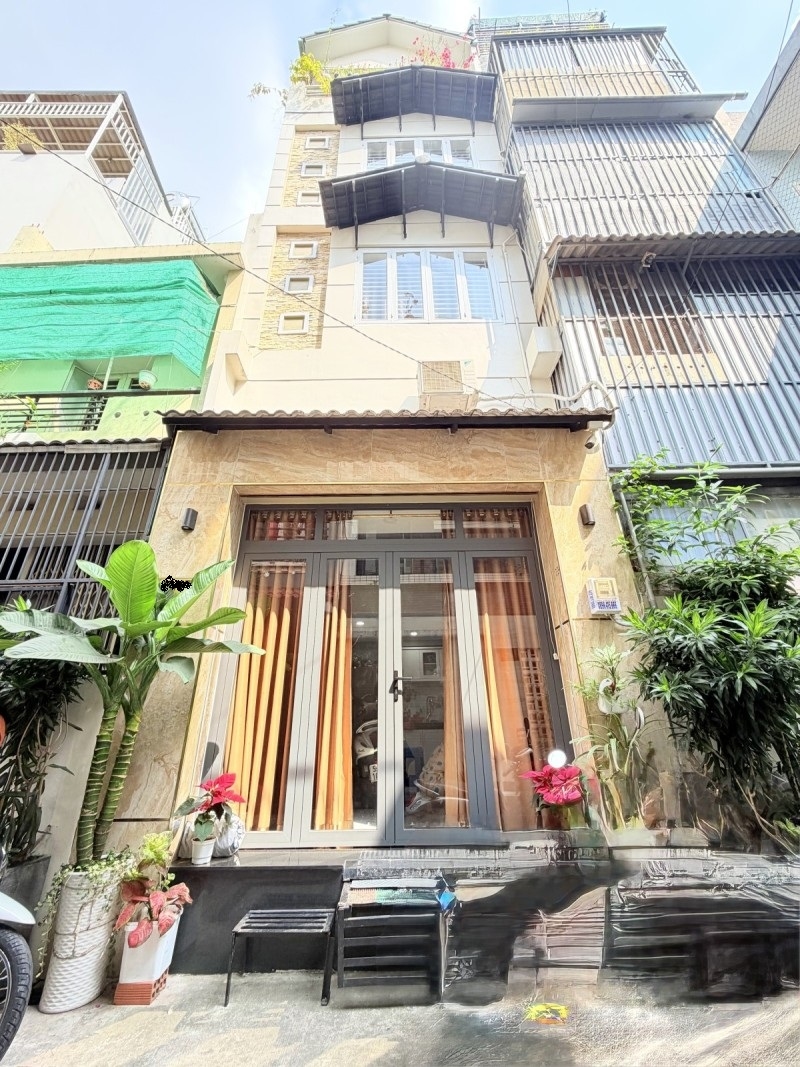 Nhà đẹp hẻm xe hơi 4m tại Nguyễn Hồng Đào, Tân Bình, 100m² chỉ 5.2 tỷ - Cơ hội vàng!