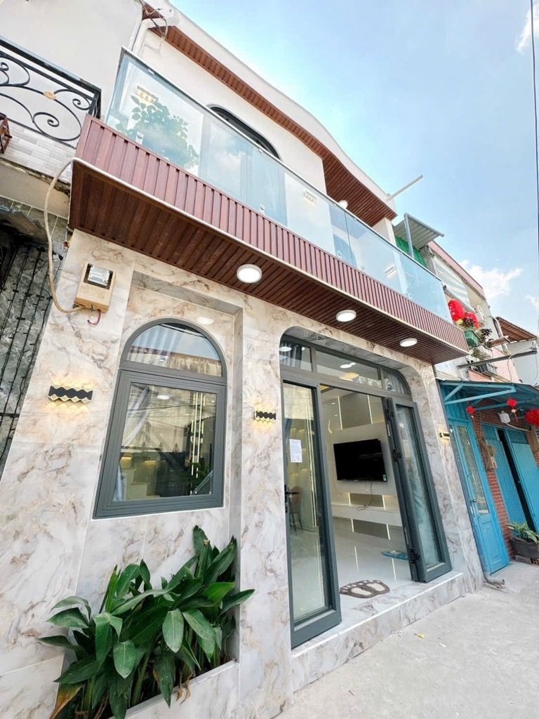 Nhà đẹp 2 mặt tiền hẻm 1283 Huỳnh Tấn Phát Phú Thuận 30m² - Sổ hồng riêng, giá tốt!