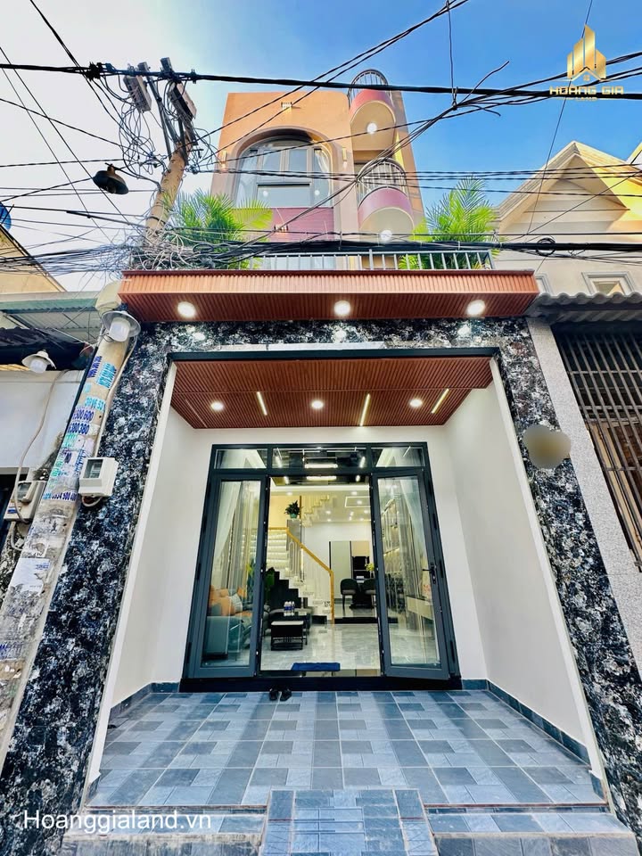 Nhà đẹp Quận Tân Bình 53.5m² - Phòng ngủ dưới trệt, hẻm xe hơi thông thoáng!