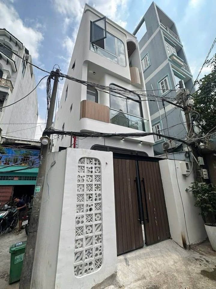 Căn hộ dịch vụ 4 tầng 118A Tôn Đản, Quận 4, 145m² - Đầu tư sinh lời 100 triệu/tháng!