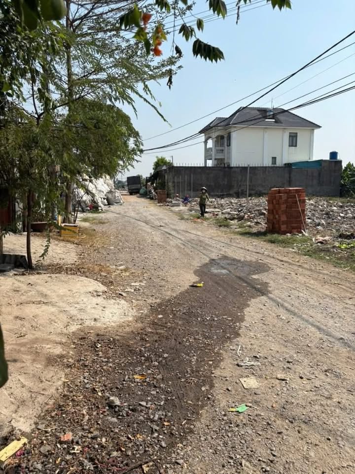 Lô đất đẹp Đông Thạnh 100m² giá thỏa thuận - Sổ hồng riêng, mặt tiền rộng rãi!