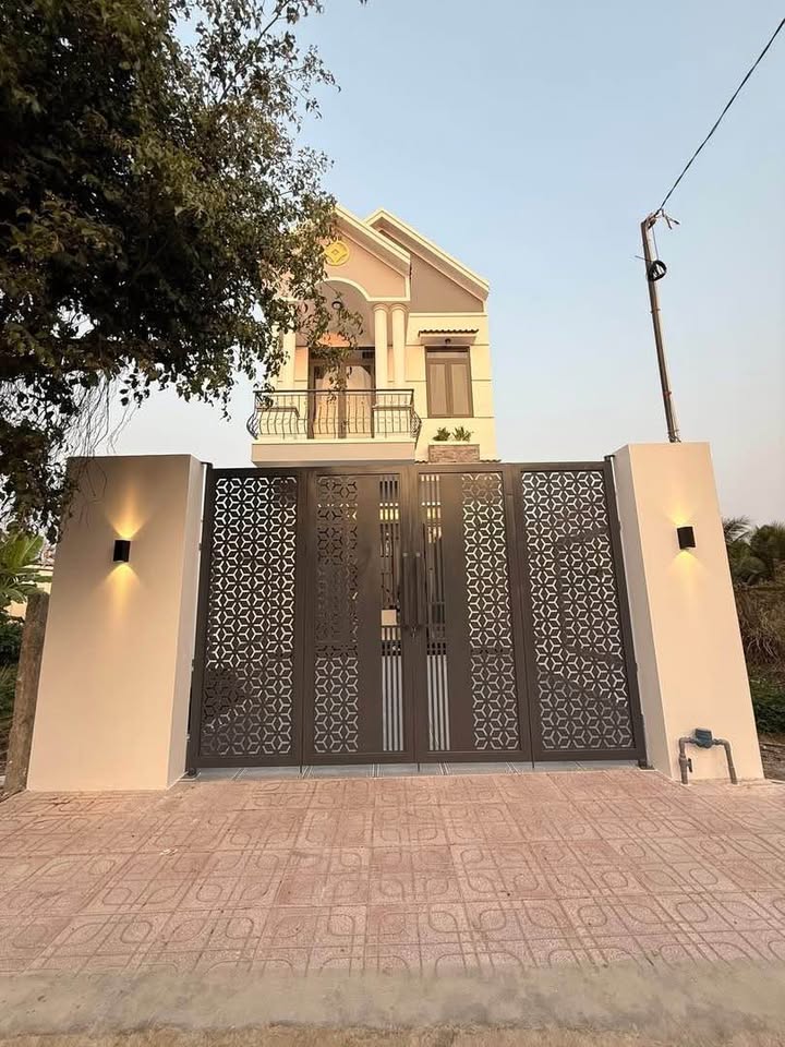 Nhà lầu mặt tiền nhựa tại Mỹ Phong, 100m² - Đầu tư tiềm năng phát triển!