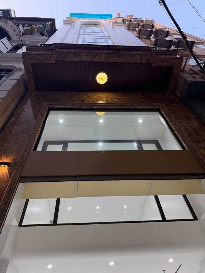 Nhà 7 tầng Trần Duy Hưng 65m² giá 33 tỷ - Thiết kế hiện đại, ô tô vào nhà!