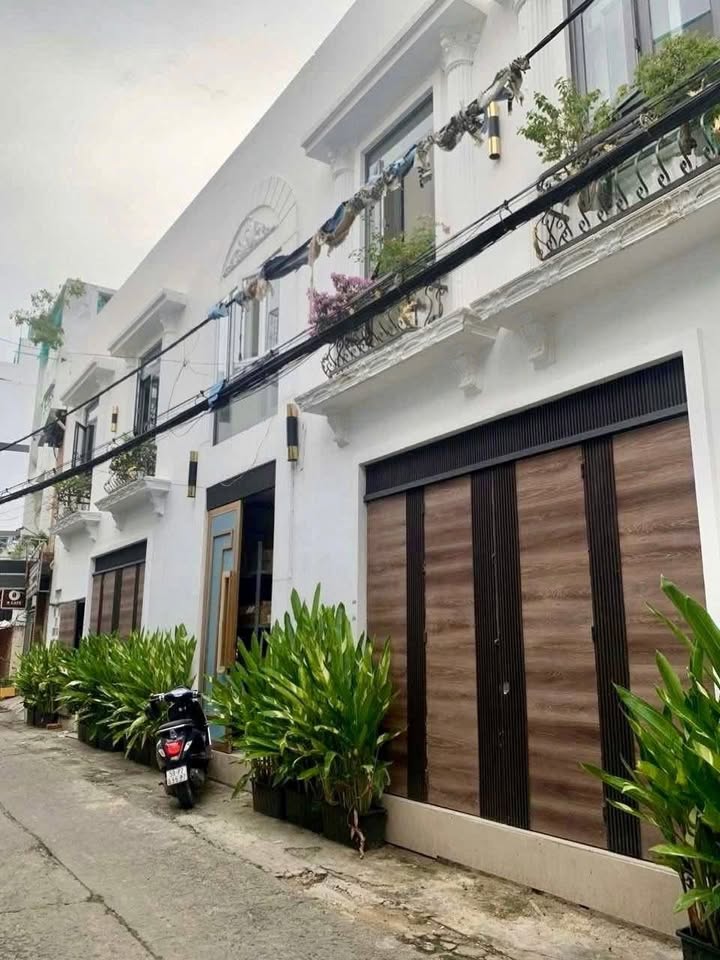 Nhà Phố Đồng Đen Tân Bình 90m² - Mặt Tiền Kinh Doanh Sầm Uất!