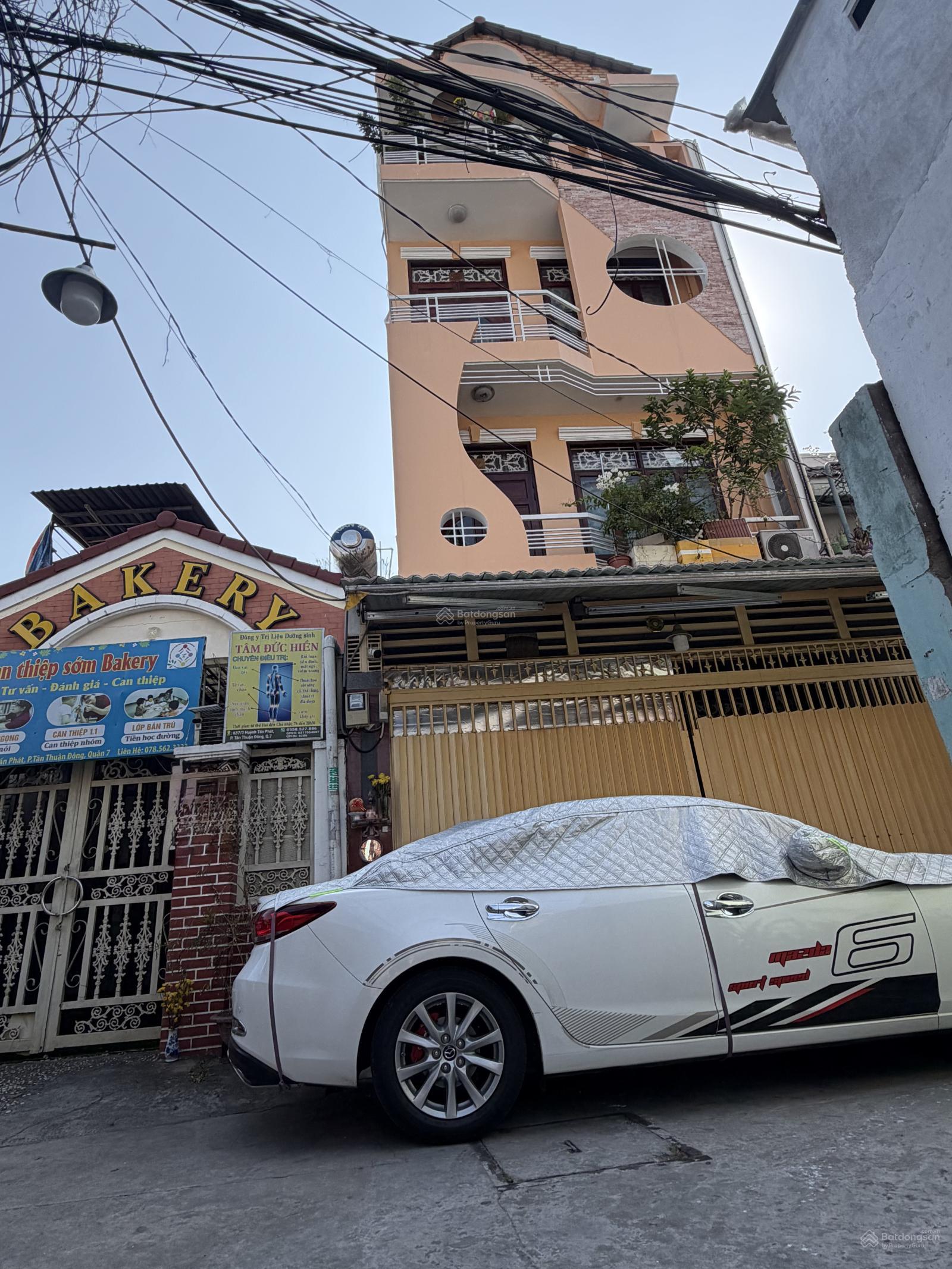 Nhà 4 Tầng Quận 7 110m² - Ô tô vào tận nhà, giá 12.5 tỷ!