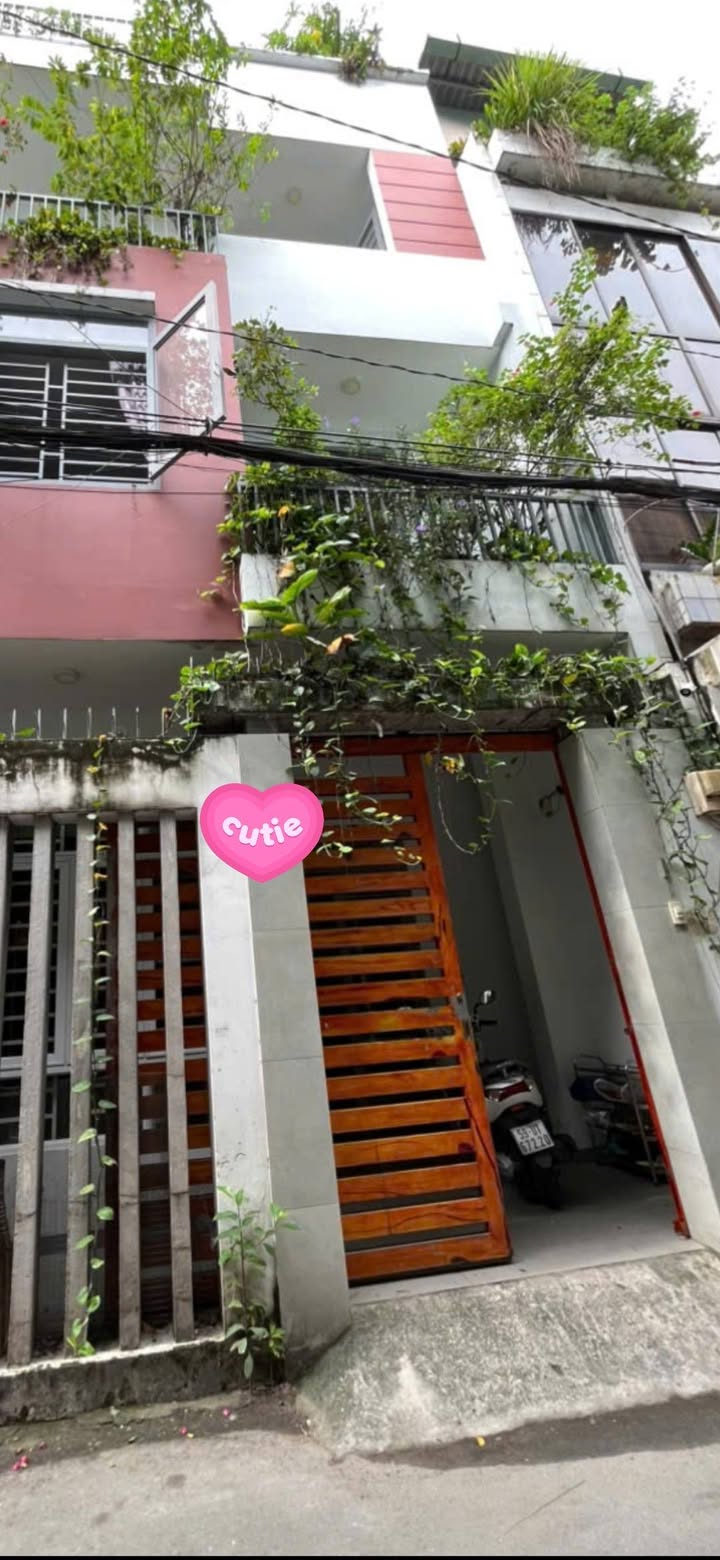 Nhà Quận Tân Bình 50m² 4 tầng - Ô tô vào tận nhà, sổ hồng sẵn!