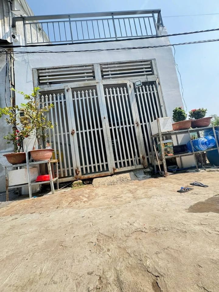 Nhà 100m² Bình Chánh - 4PN, Sân Xe Hơi, Giá 2.6 Tỷ