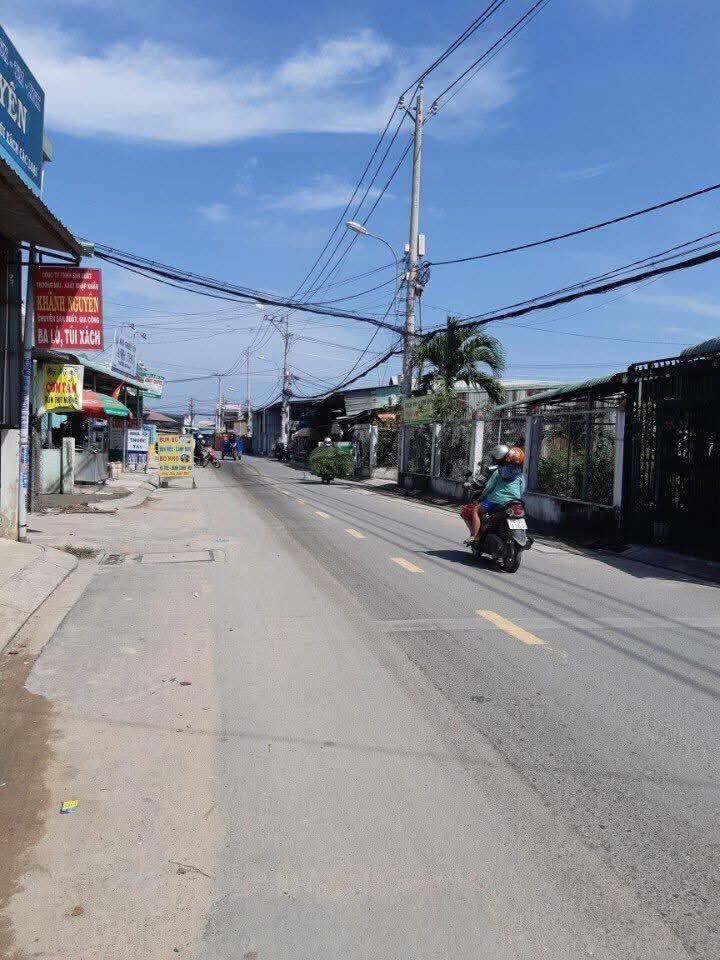 Nhà Mặt Tiền Quận 12 100m² - Kinh Doanh Ngay, Sổ Hồng Đủ