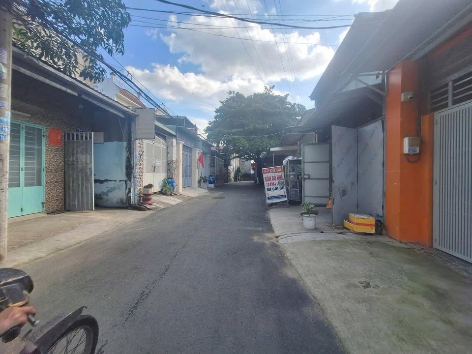 Đất Phước Long B Tân Uyên 203m² - Ngang 10.5m, Hơn 30tr/m², Sổ Đỏ Full Thổ Cư