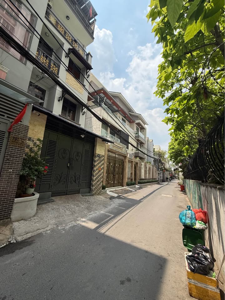 Nhà 4 Tầng Kinh Doanh Quận 7 - Dòng Tiền 50 Triệu/Tháng