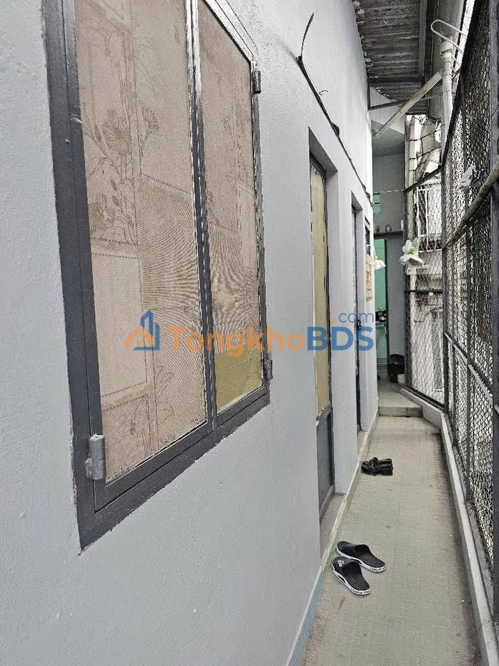 Nhà trọ 165m² Quận 7 - Hẻm xe hơi, Sổ hồng riêng, Giá 12.99 tỷ