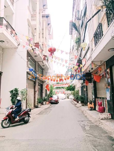 Nhà 5 tầng Phường 15 Tân Bình 64m² 8 tỷ - Ô tô vào nhà