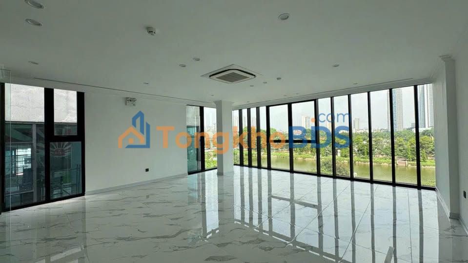 Cho thuê sàn văn phòng 80m² Trần Vỹ, Cầu Giấy - Tòa kính mới, ô tô đỗ cửa
